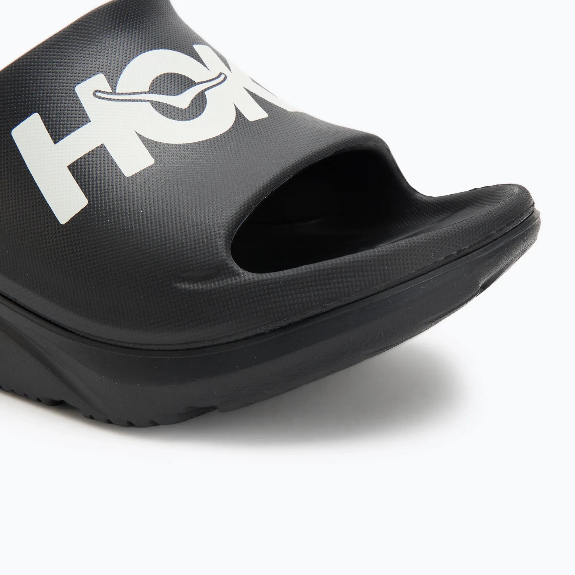 Hoka Ora Athletic Slide Unisex in Black / White running shoe photo 57 | MotionLab