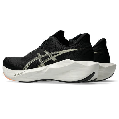 ASICS Novablast 6 Men Regular in Black / Khaki — opposite front angle view | MotionLab